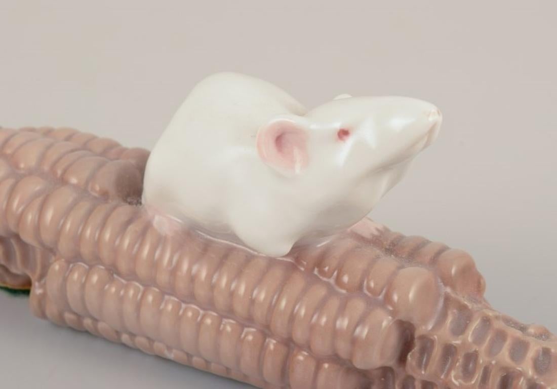 Early 20th Century Royal Copenhagen, Denmark. Porcelain figurine of a mouse on a corn cob. For Sale