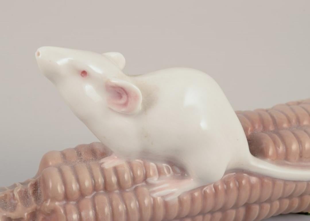 Royal Copenhagen, Denmark. Porcelain figurine of a mouse on Royal Copenhagen, Denmark. Porcelain figurine of a mouse on