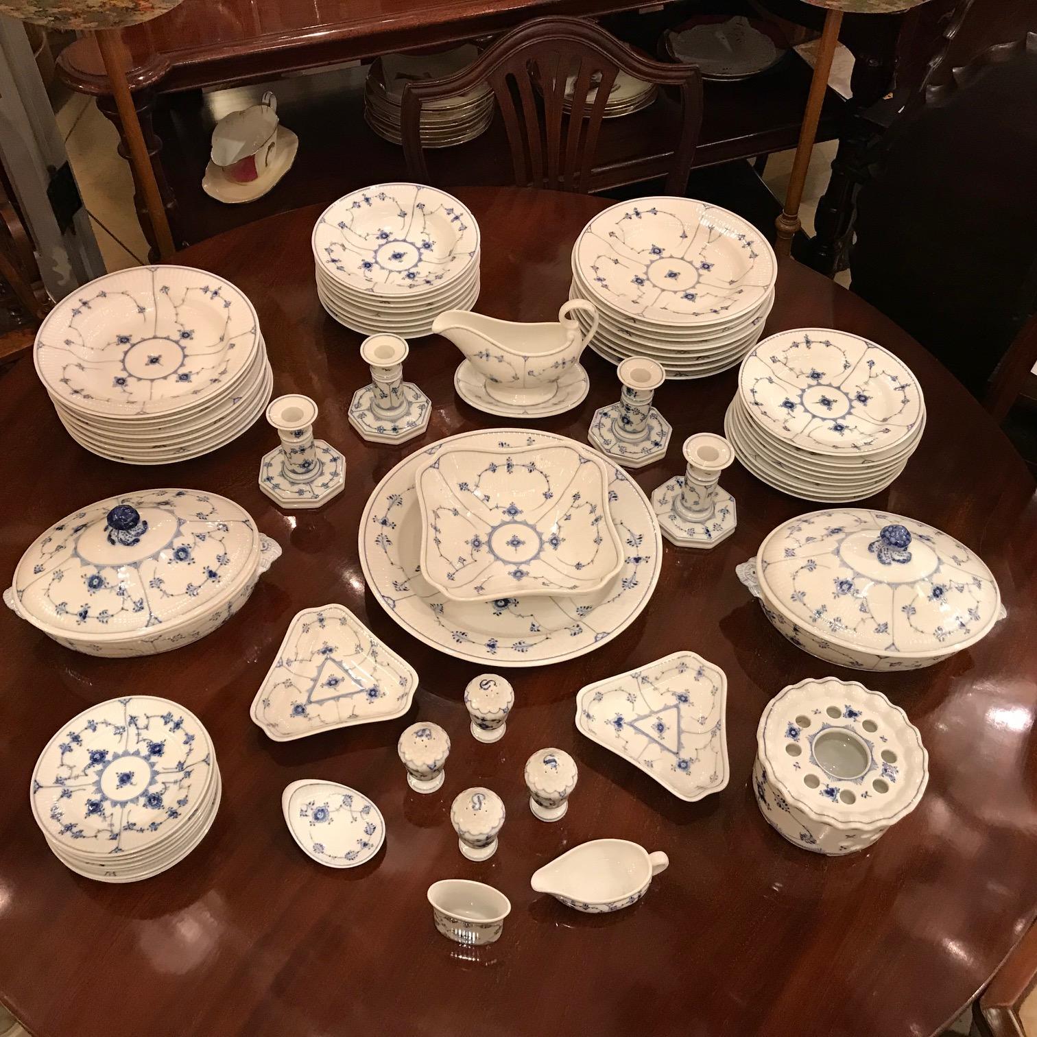 This wonderful service is full of character, it has been lovingly assembled from antique and vintage pieces so there is minor variation in color from pale blue to deeper shades It has several rather rare and interesting serving pieces. It