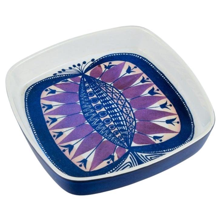 Royal Copenhagen, faience bowl with motif of peacock in modernist style. 1970s.  For Sale