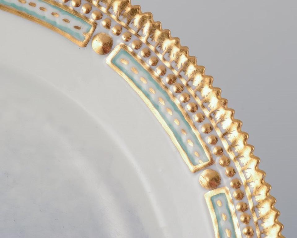 Début du 20ème siècle Royal Copenhagen Fauna Danica, assiette à dîner avec un motif de renard arctique. en vente