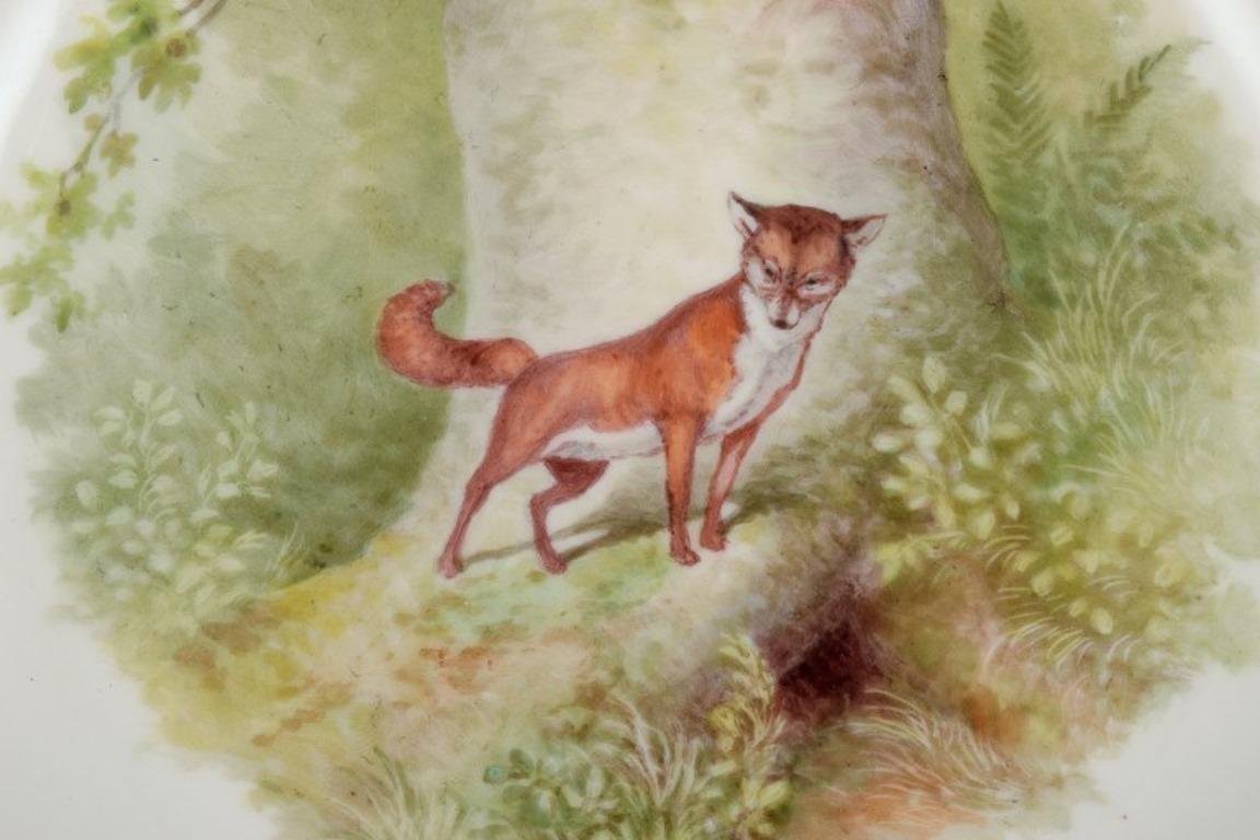 Royal Copenhagen Fauna Danica Essteller mit einem Motiv eines Fuchses in einer Landschaft. Handbemalt.
1926.
Dritte Fabrikqualität.
Perfekter Zustand.
Abmessungen: D 25,0 cm x H 3,3 cm.