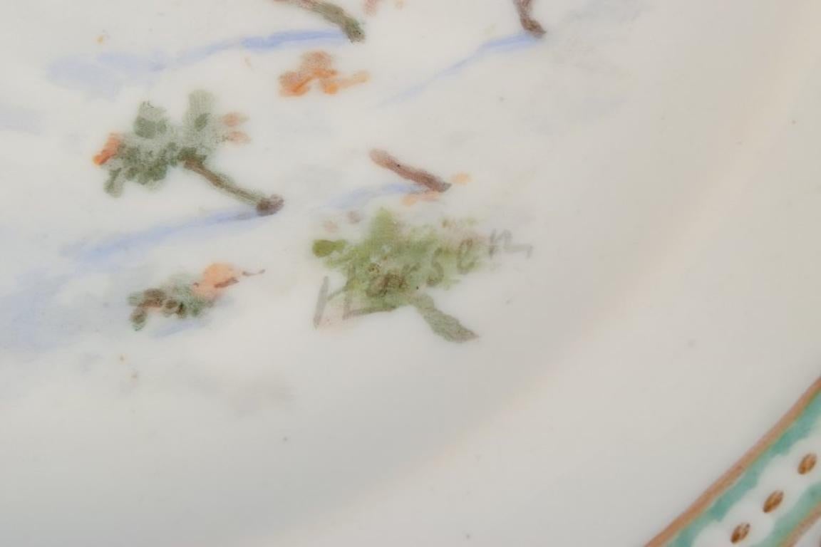 Porcelain Royal Copenhagen Fauna Danica dinner plate with a motif of a hare. For Sale