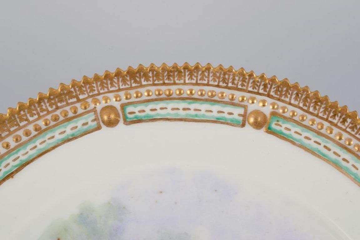 Hand-Painted Royal Copenhagen Fauna Danica dinner plate with a motif of a pine marten For Sale