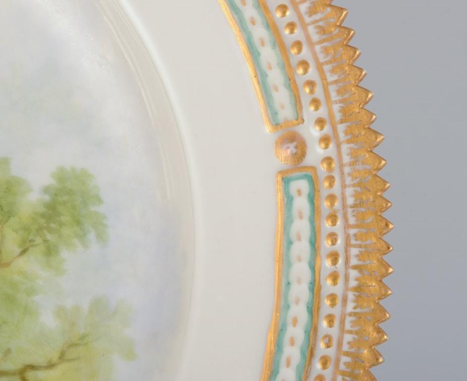 Mid-20th Century Royal Copenhagen Fauna Danica dinner plate with a motif of a squirrel. For Sale