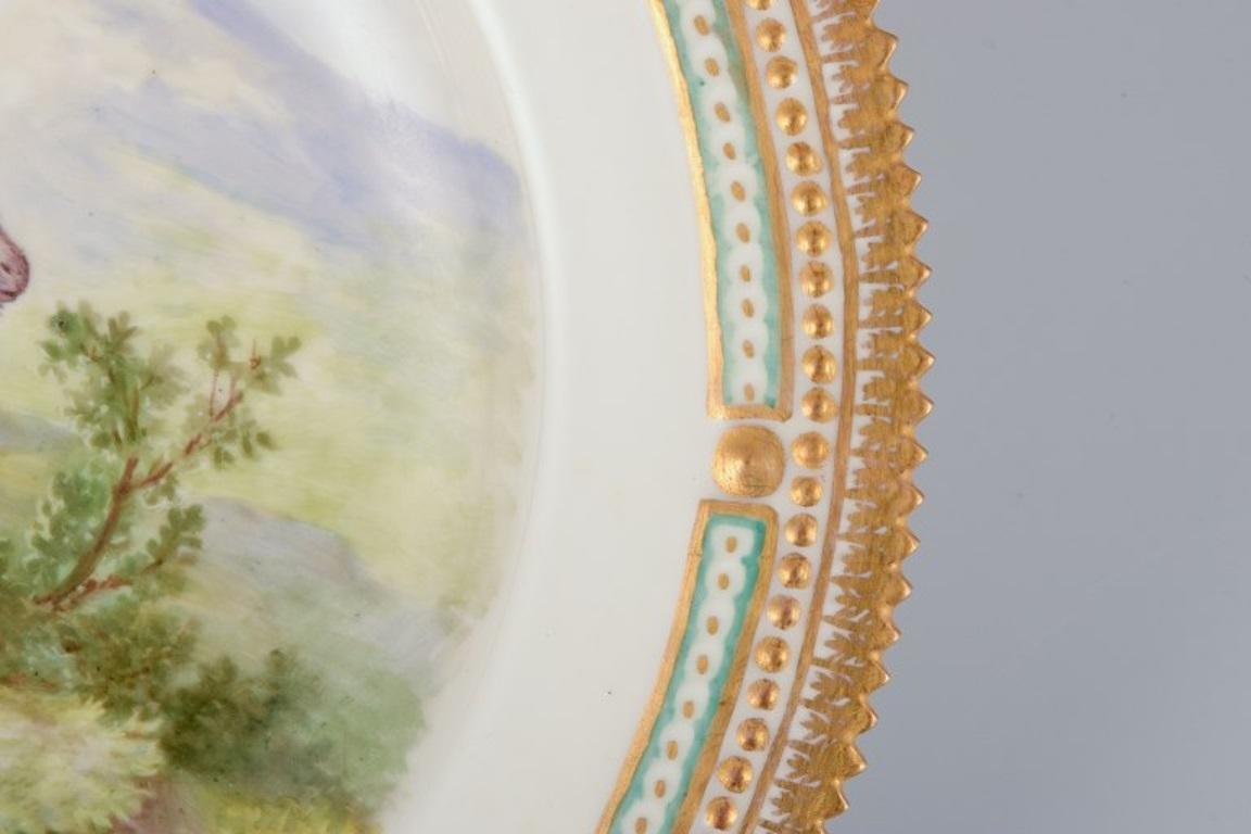Hand-Painted Royal Copenhagen Fauna Danica dinner plate with a motif of an ibex. For Sale