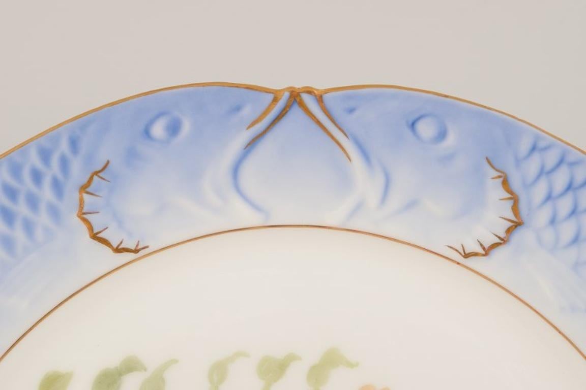 Hand-Painted Royal Copenhagen Fauna Danica fish plate in porcelain. Approx. 1930 For Sale