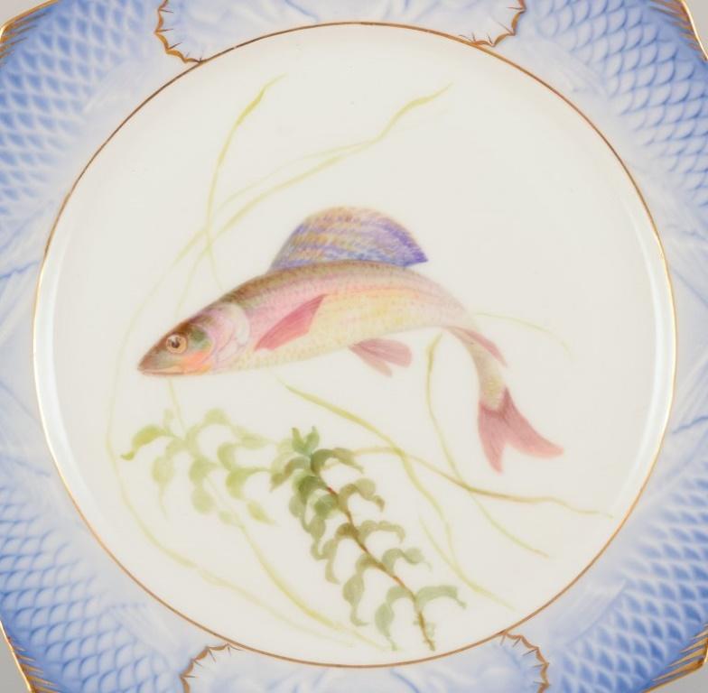 Royal Copenhagen Fauna Danica fish plate. Hand-painted fish motif with gold decoration.
Approximately from the 1930s.
Model number: 1212/3002.
Marked.
Perfect condition.
First factory quality.
Dimensions: Diameter 23.0 cm x Height 2.5 cm.
