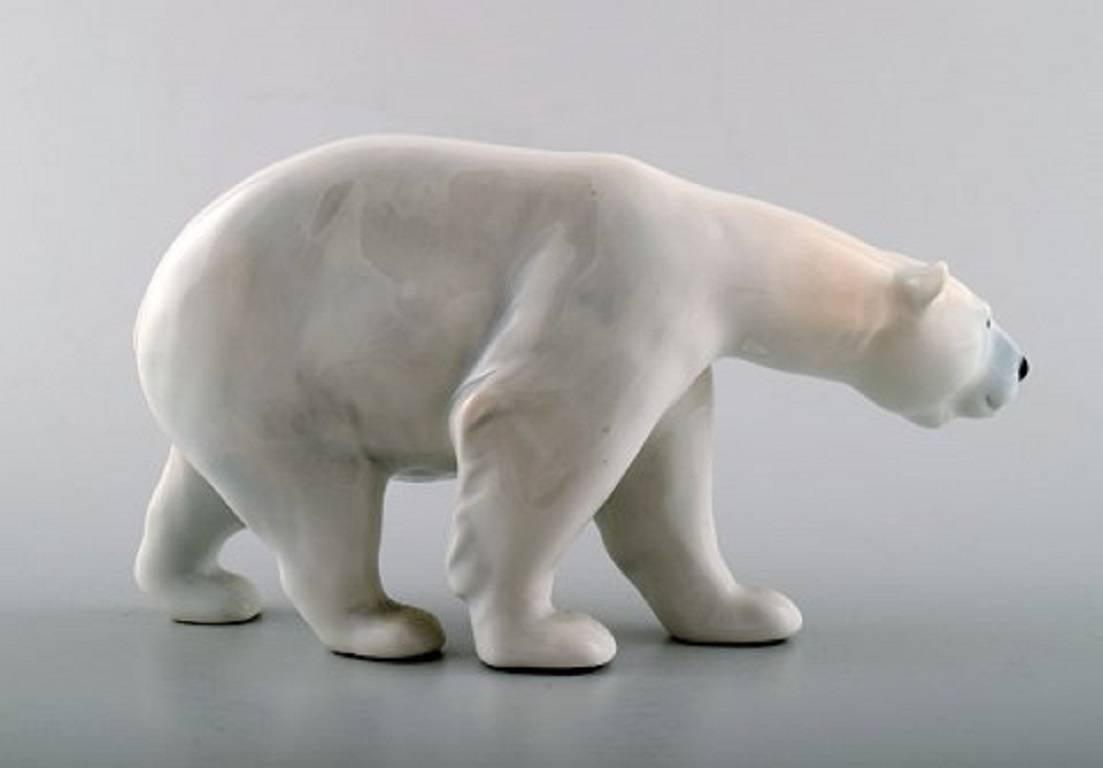 Royal Copenhagen figure walking polar bear # 320/053.
Measures 18 cm. x 9 cm.
In perfect condition. 1st. assortment.
Designed by Carl Johan Bonnesen in 1900.