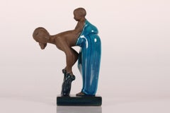 Royal Copenhagen Figurine 21565 Young Woman with her Child by Johannes Hedegaard