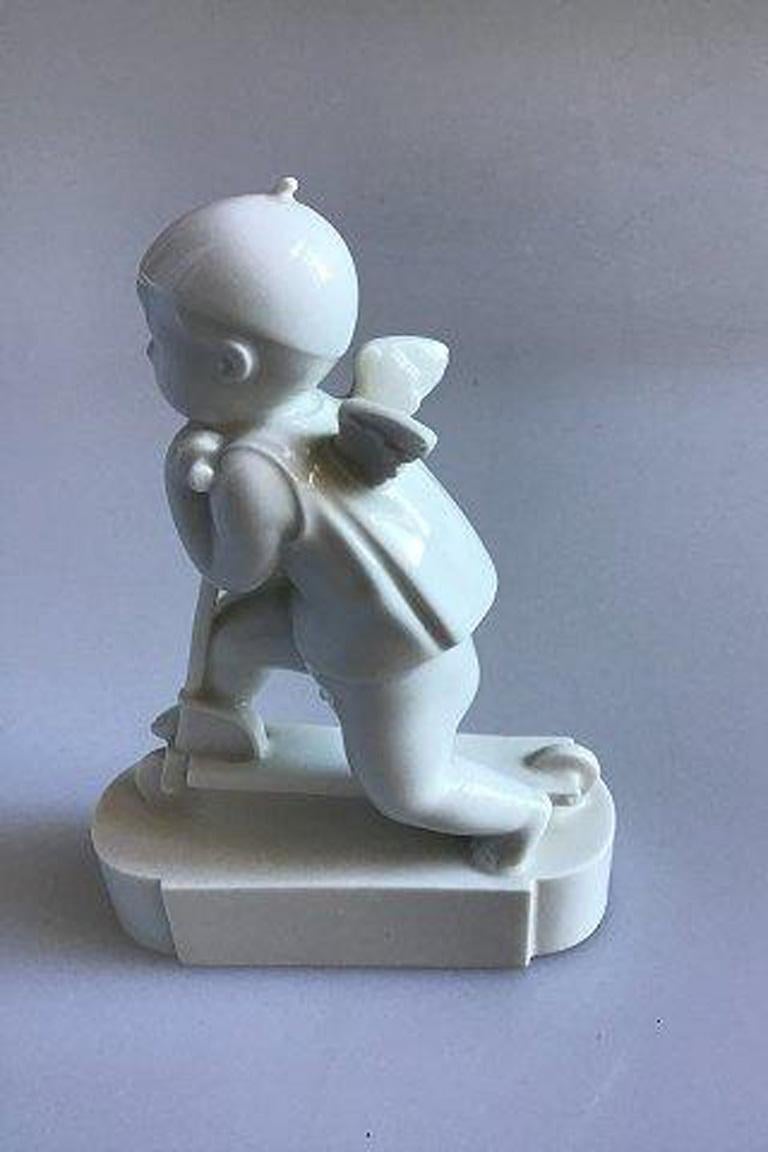 20th Century Royal Copenhagen Figurine, Cupid on Scooter No 12477 For Sale