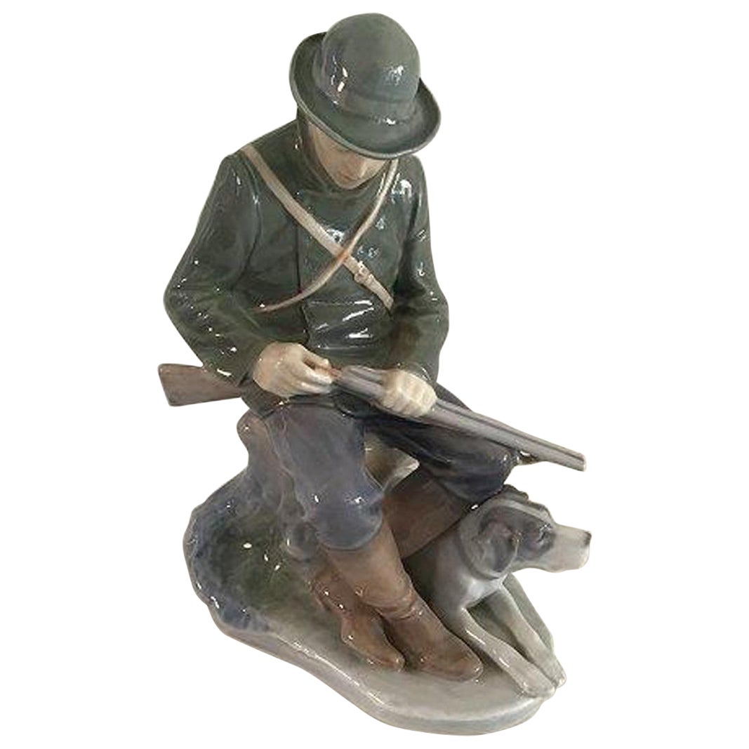 Figurine chasseur avec chien Royal Copenhagen n° 1087 en vente