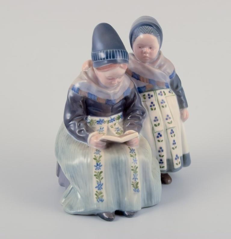 Danish Royal Copenhagen figurine in porcelain. Two 