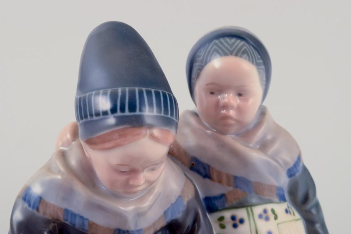 Mid-20th Century Royal Copenhagen figurine in porcelain. Two 