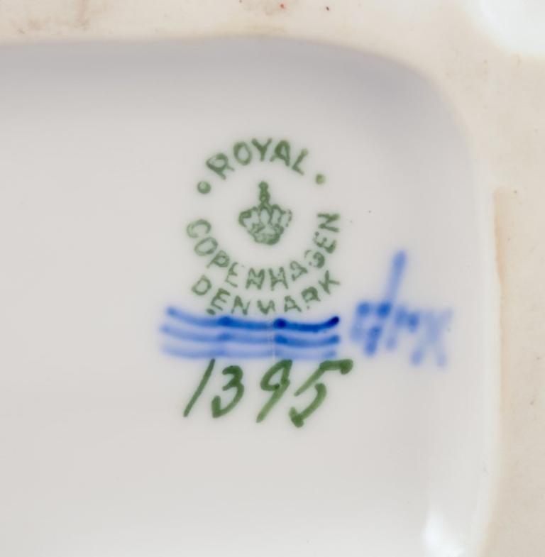 Royal Copenhagen figurine in porcelain. Two 