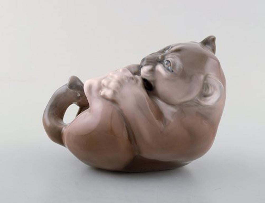 Royal Copenhagen Figurine, lion cub.
Decoration number 2596.
In perfect condition. 1st factory quality. 
Measures 10 x 15 cm