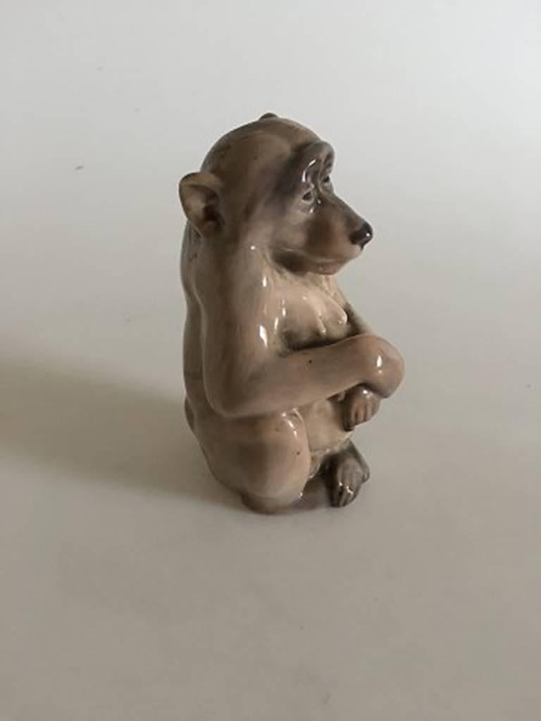 Royal Copenhagen figurine monkey #1444. Measures: 13cm x 8cm and is in perfect condition. Pre-1923.