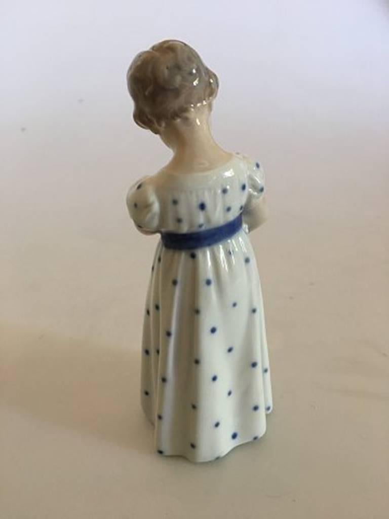 Royal Copenhagen figurine no. 3539 girl in nightgown with doll. Marked as a third. In nice whole condition. Measures: 14.5 cm H.