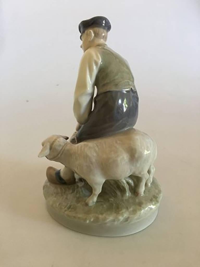 Royal Copenhagen figurine no. 627. Young man with sheep. Third quality. In nice whole condition.