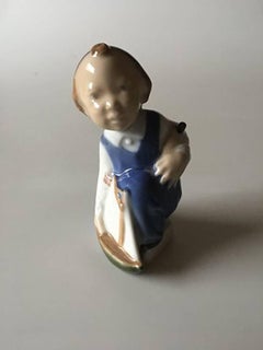 Royal Copenhagen Figurine of Boy with Ship - Aage #3272