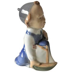 Royal Copenhagen Figurine of Boy with Ship - Aage #3272