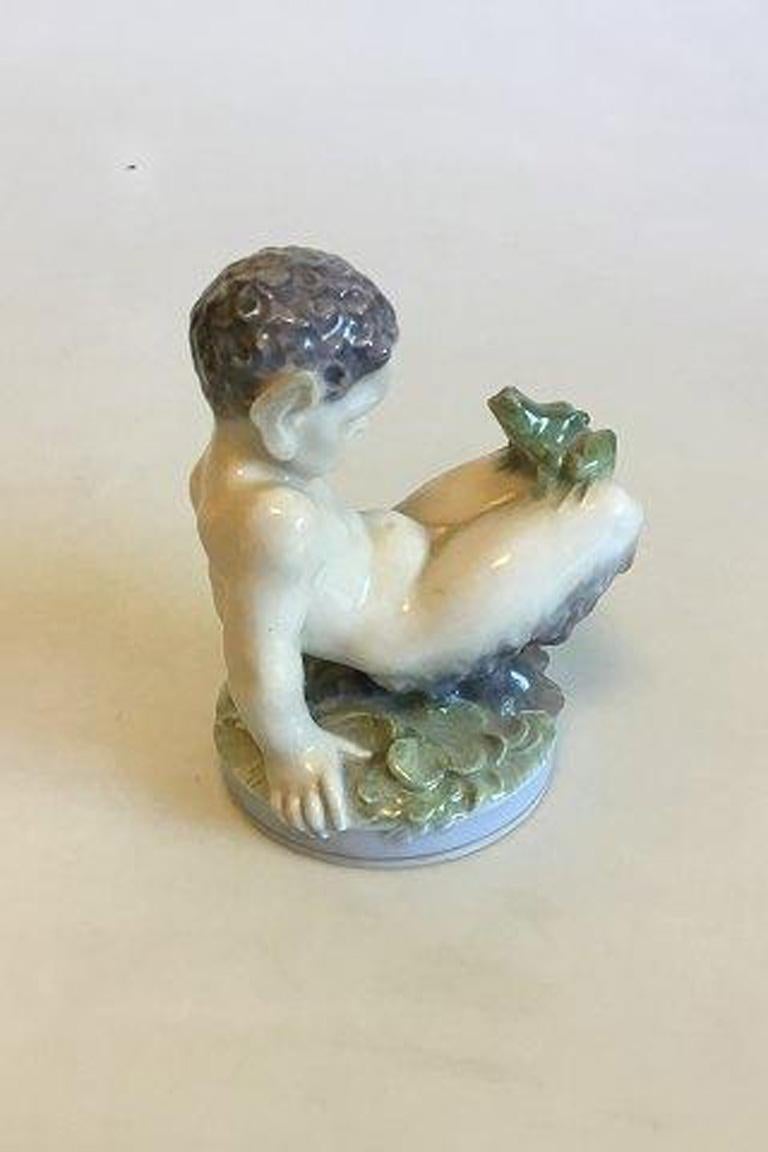 20th Century Royal Copenhagen Figurine of Faun with Frog No 1713 For Sale