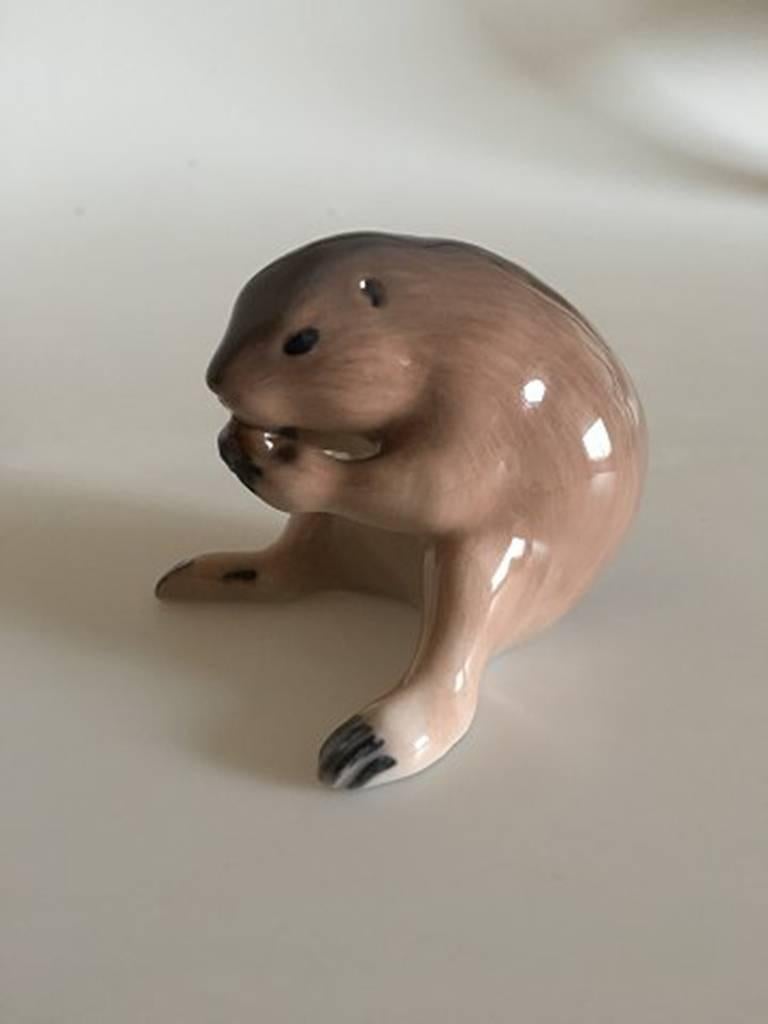 Royal Copenhagen figurine of lemming #598. Designed by Theodor Madsen. Measures 8 cm x 6 cm. First quality.