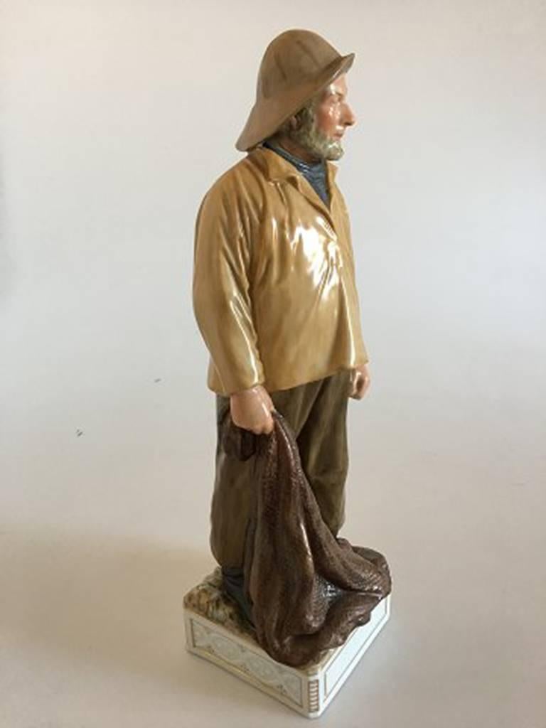 Royal Copenhagen figurine over-glaze skagen #12214. Measures: 34cm and is in perfect condition. Designed by Carl Martin-Hansen.