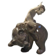 Figurina Royal Copenhagen Pan/Fauno su orso n. 976