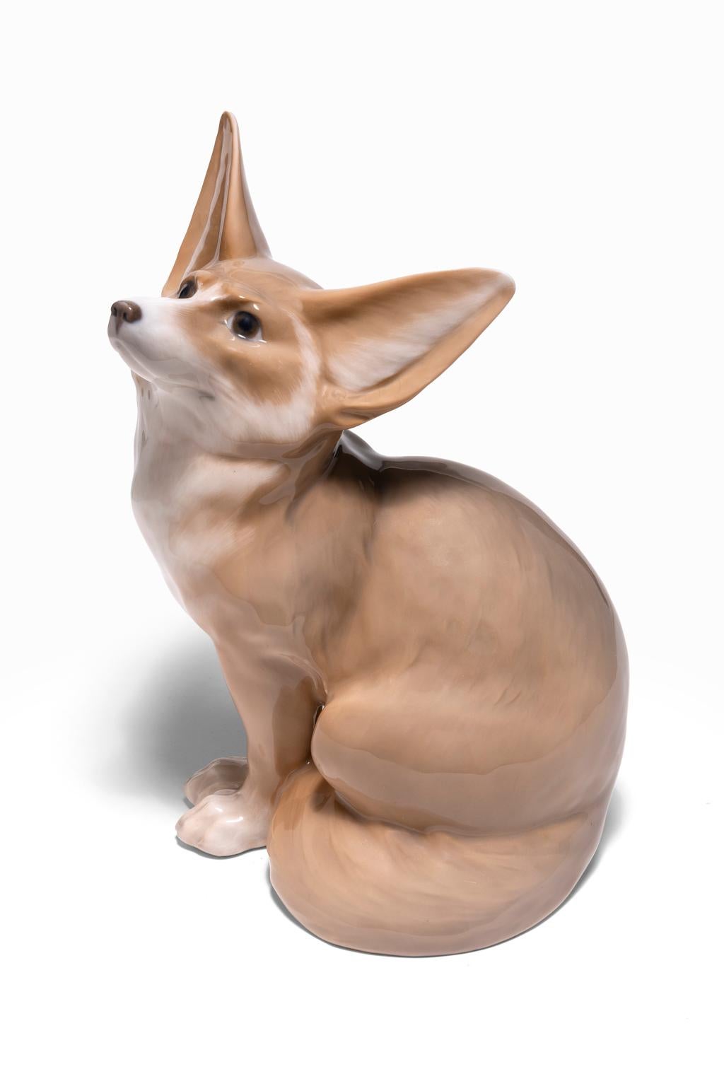 The Royal Copenhagen rare figure of a Desert Fox #1327 was modeled by Christian Thomsen in 1911 showing the large ears and substantial tail. It is considered one of the best of Copenhagen.

Christian Thomsen (1860 - 1921) was a Danish sculptor. He