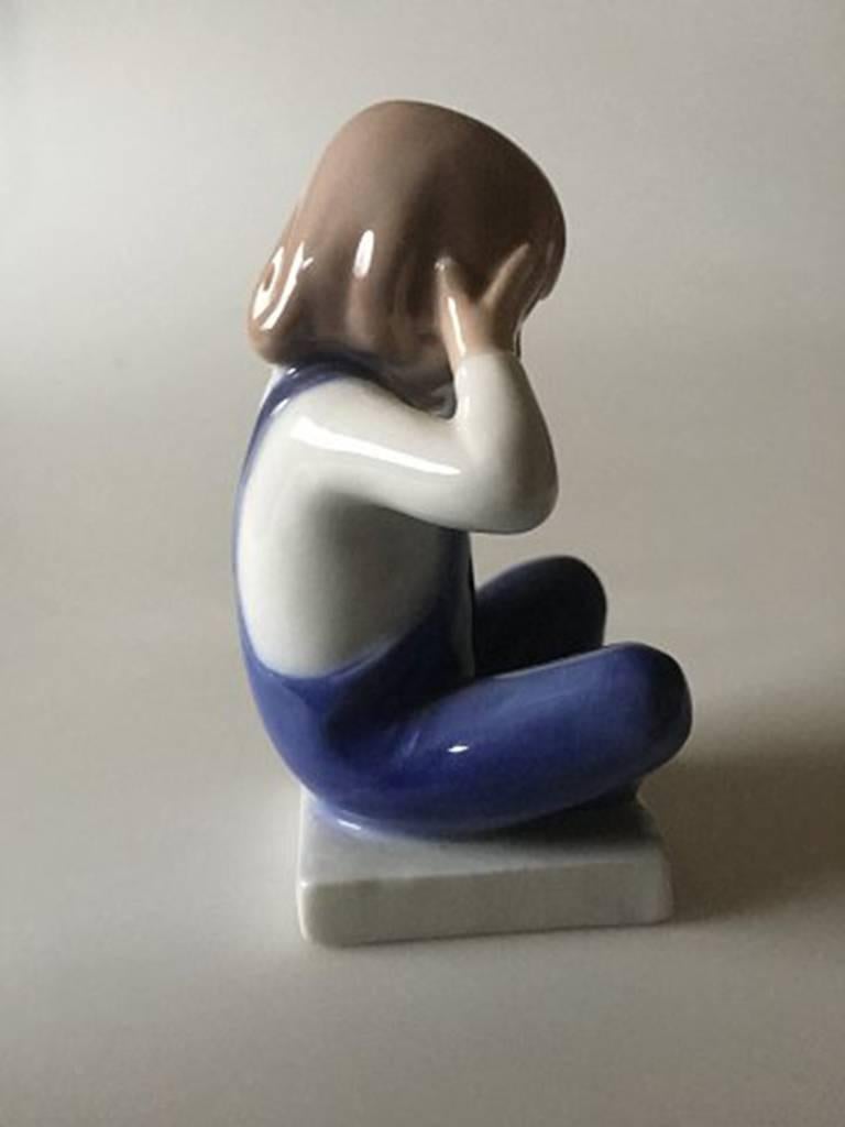 Royal Copenhagen figurine, See no Evil, 5460. Measures 9cm and is in good condition. Designed by Hanne Varming.
 