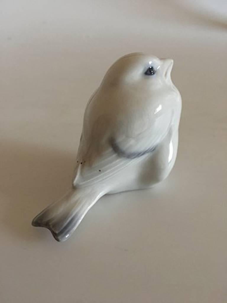 Royal Copenhagen figurine sparrow #1519. Measures 6cm high and is in good condition. Designed by A. Nielsen in 1913.