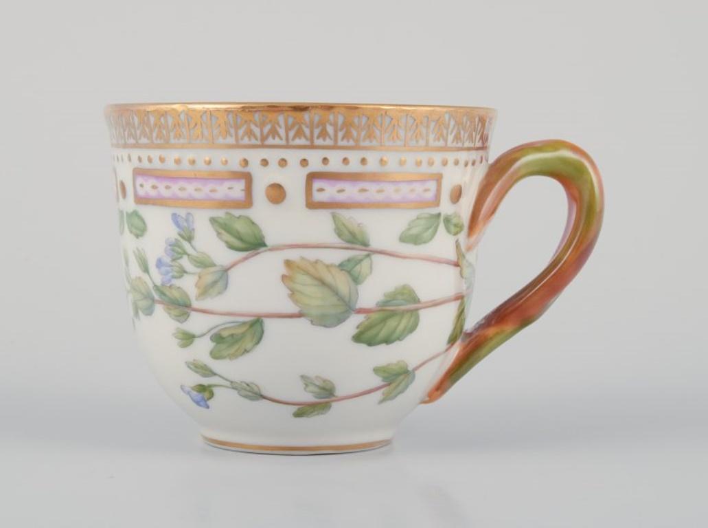 Hand-Painted Royal Copenhagen Flora Danica demitasse cup with saucer in porcelain. For Sale