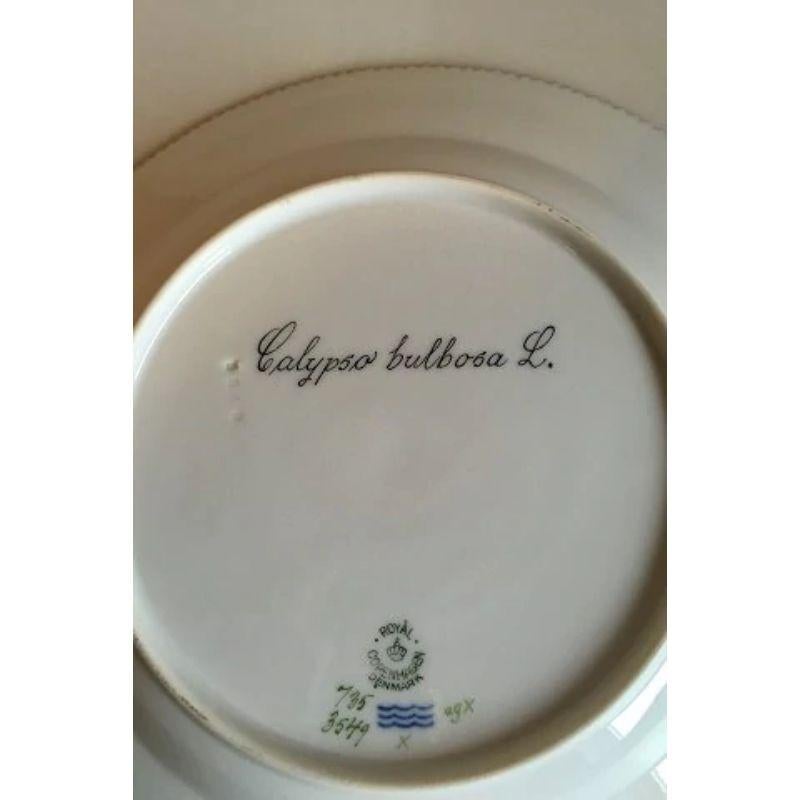 Royal Copenhagen Flora Danica Dinner Plate No 735/3549.

Latin name: Calypso bulbosa L.

Measures 25.5 cm / 10 3/64