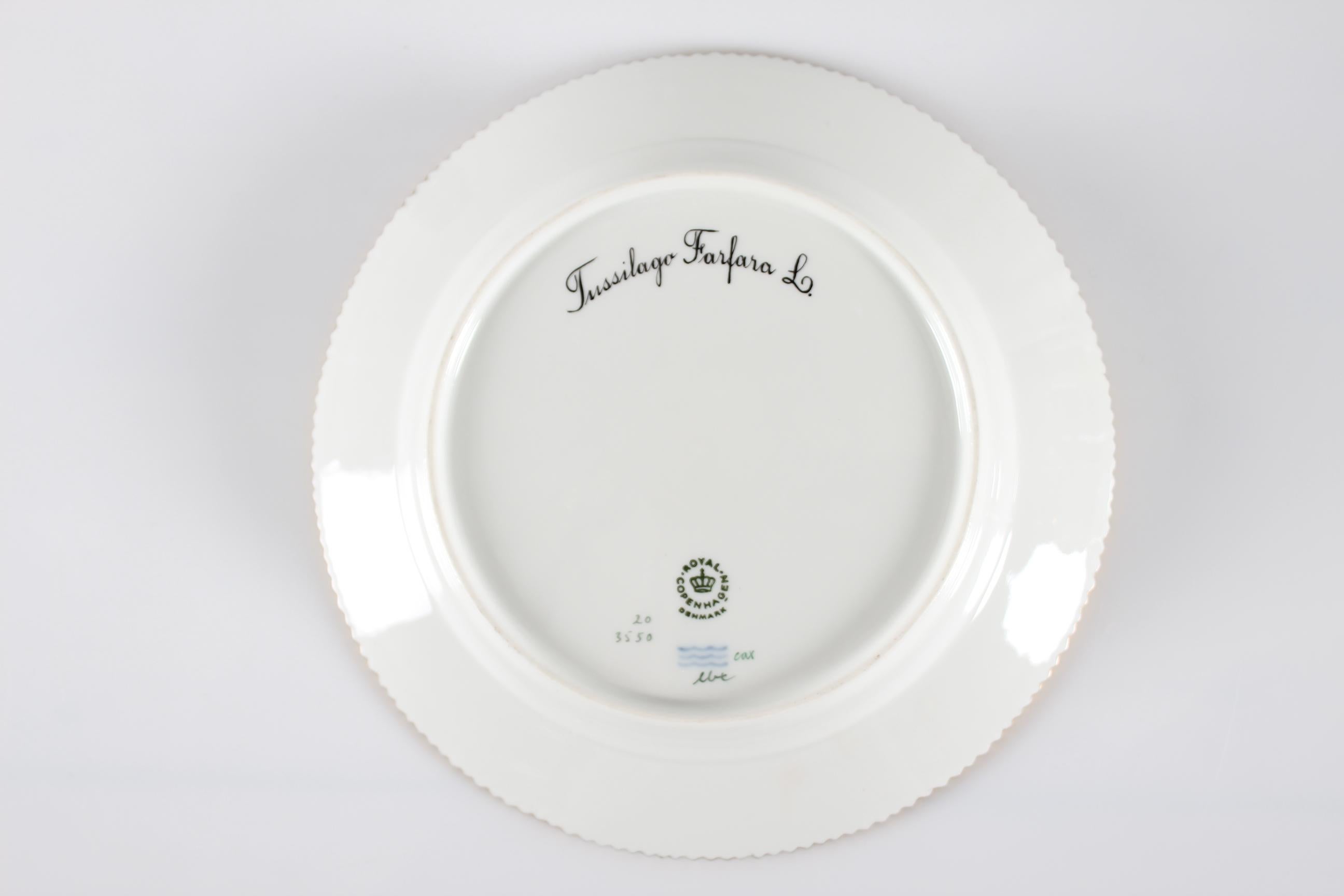 Royal Copenhagen Flora Danica porcelain hand painted in Denmark

Round dish or lunch plate model number 20/3550.
With production stamp from the period 1969-74 and decorated with flower in latin name: Tussilago Farfara L. 

Measure: Diameter