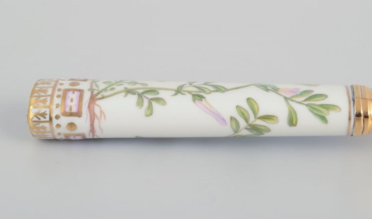 Danish Royal Copenhagen Flora Danica/Georg Jensen.  Dining spoon with porcelain handle