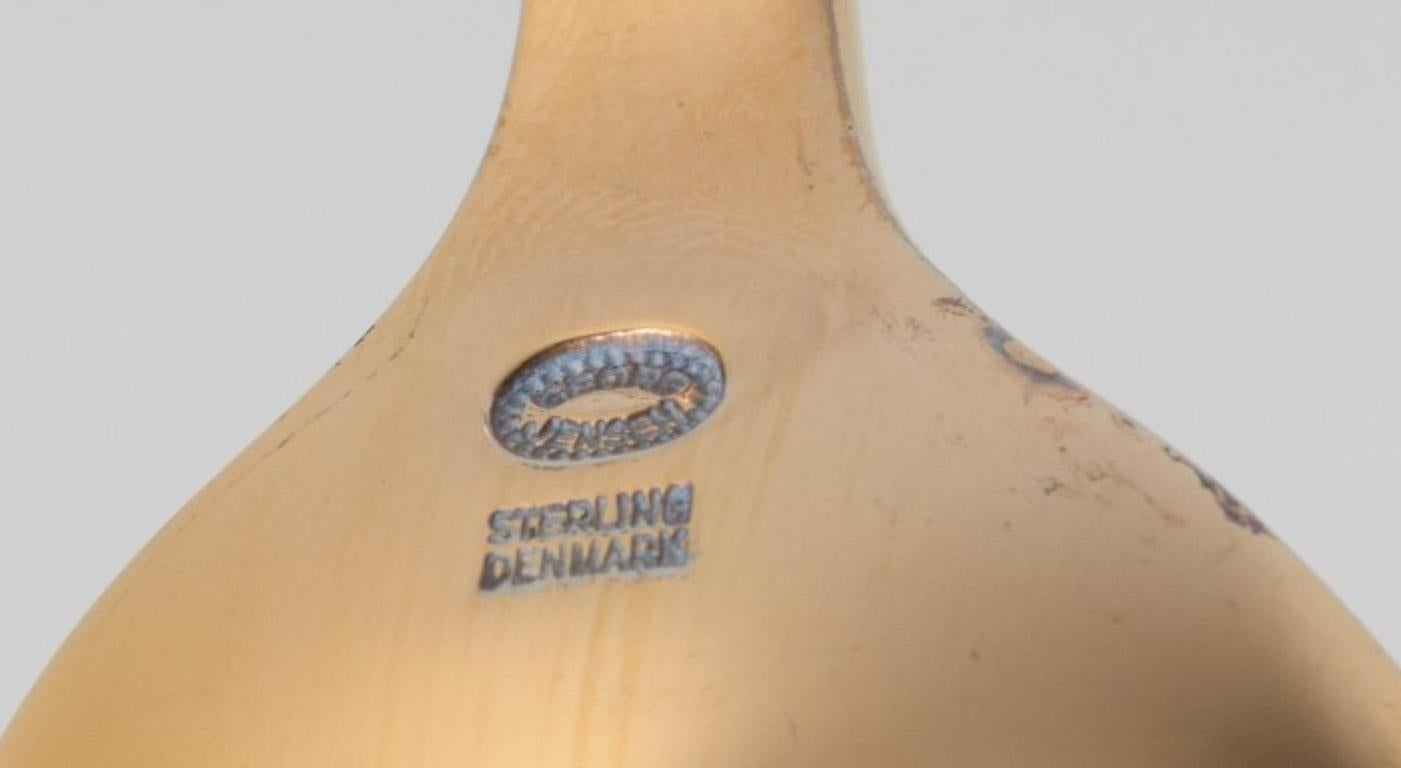 Late 20th Century Royal Copenhagen Flora Danica/Georg Jensen.  Dining spoon with porcelain handle