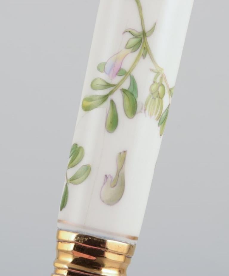 Sterling Silver Royal Copenhagen Flora Danica/Georg Jensen.  Dining spoon with porcelain handle