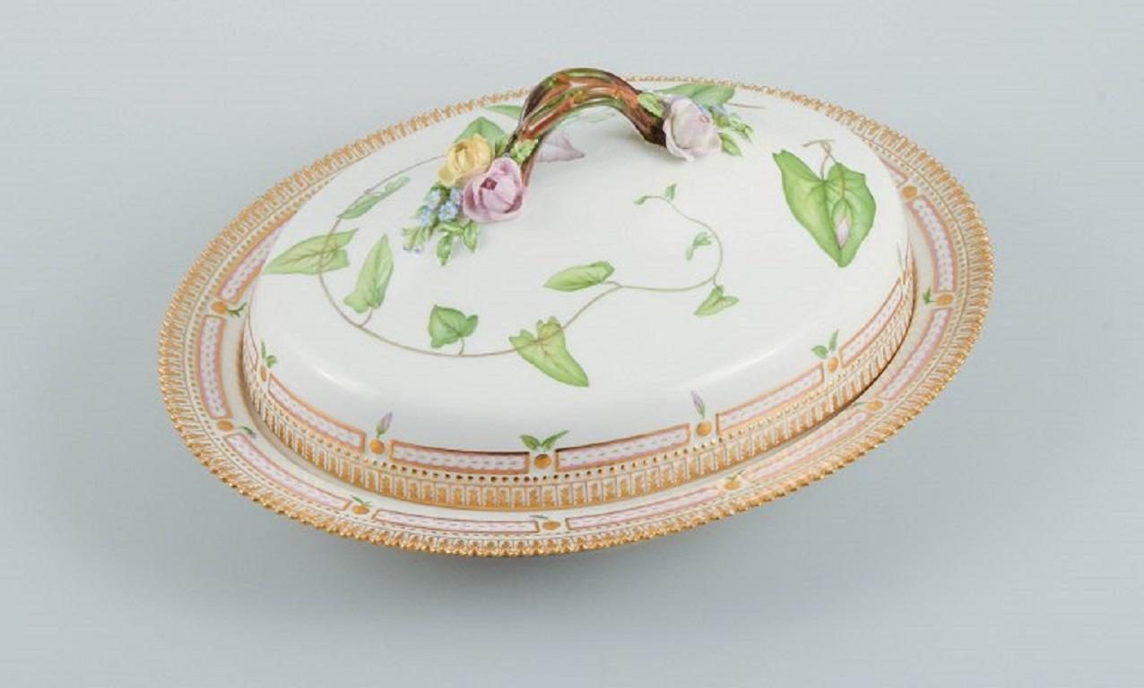 Royal Copenhagen Flora Danica large tureen / lidded bowl, branch-shaped handle, moulded flowers.
Design No. 20/3567.
Length 40 cm. Height 17 cm.
1st. factory quality. 
In perfect condition.