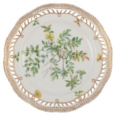 Royal Copenhagen Flora Danica, open lace lunch plate. Gold rim.