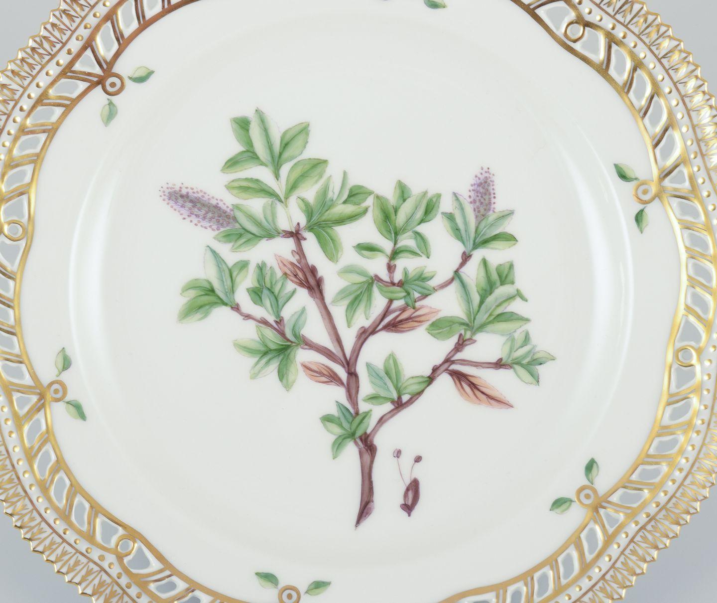 PRE-OWNED GOODS ARE EXEMPT FROM IMPORT TARIFFS FOR U.S., UK, AUSTRALIAN & CANADIAN CUSTOMERS.   
THEREFORE, NO IMPORT TARIFFS WILL BE APPLICABLE TO YOUR PURCHASE. 

Royal Copenhagen Flora Danica open lace plate in hand painted porcelain with flowers