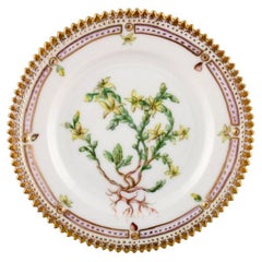 Royal Copenhagen. Flora Danica porcelain plate, decorated with flowers. Royal Copenhagen. Flora Danica porcelain plate, decorated with flowers.