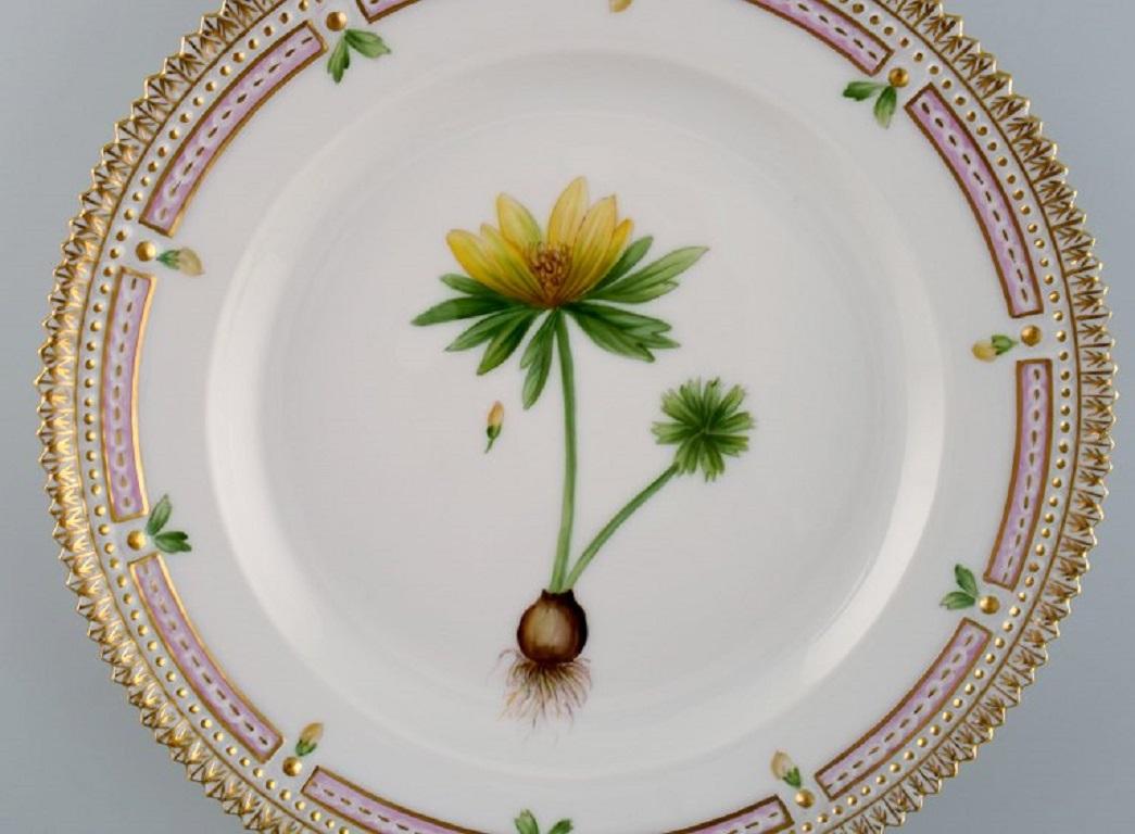 Royal Copenhagen Flora Danica salad plate in hand-painted porcelain with flowers and gold decoration. 
Model number 20/3573.
Measure: Diameter: 19.5 cm.
In perfect condition.
1st factory quality.
Stamped.