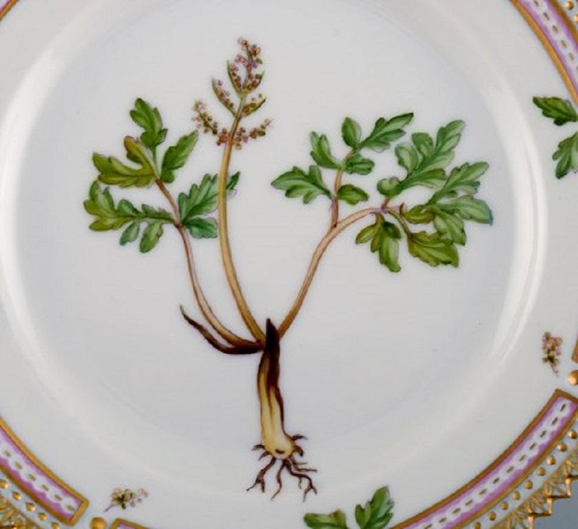 Royal Copenhagen Flora Danica side plate in hand painted porcelain with flowers and gold decoration.
Model number 20/3552.
Measures: Diameter 14.5 cm.
In perfect condition.
1st factory quality.
Stamped.