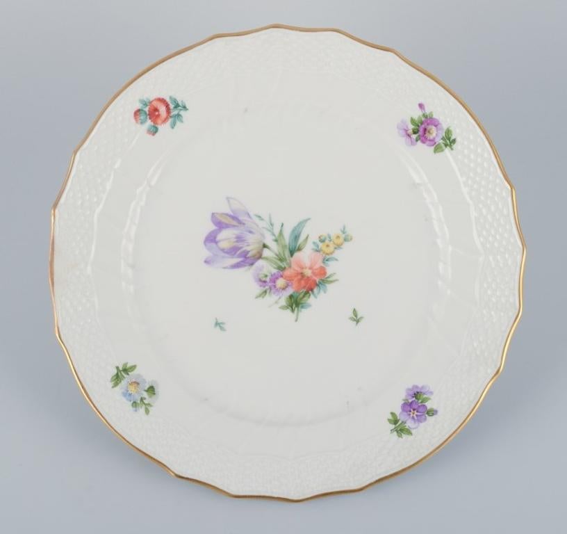 Mid-20th Century Royal Copenhagen, four Saxon Flower dinner plates in porcelain. For Sale