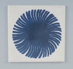 Royal Copenhagen, four tiles with an abstract motif. Mid-20th century.