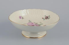 Royal Copenhagen ”Frijsenborg”. Cake plate and cake stand in porcelain.
