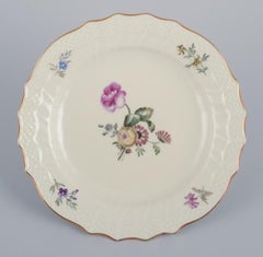 Royal Copenhagen, "Frijsenborg". Twelve plates in hand-painted porcelain.