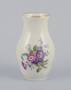 Royal Copenhagen ”Frijsenborg”. Two dishes and a vase in porcelain.