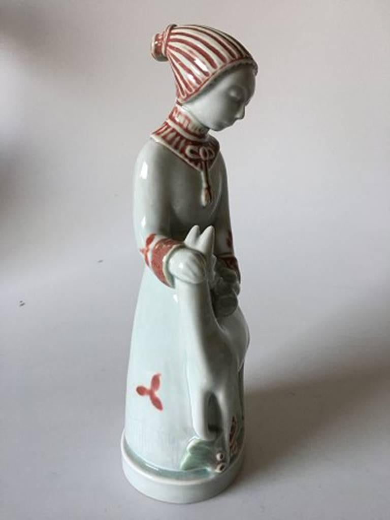 Royal Copenhagen Georg Thylstrup figurine of girl with deer #1531. Measures 25cm and is in perfect condition.